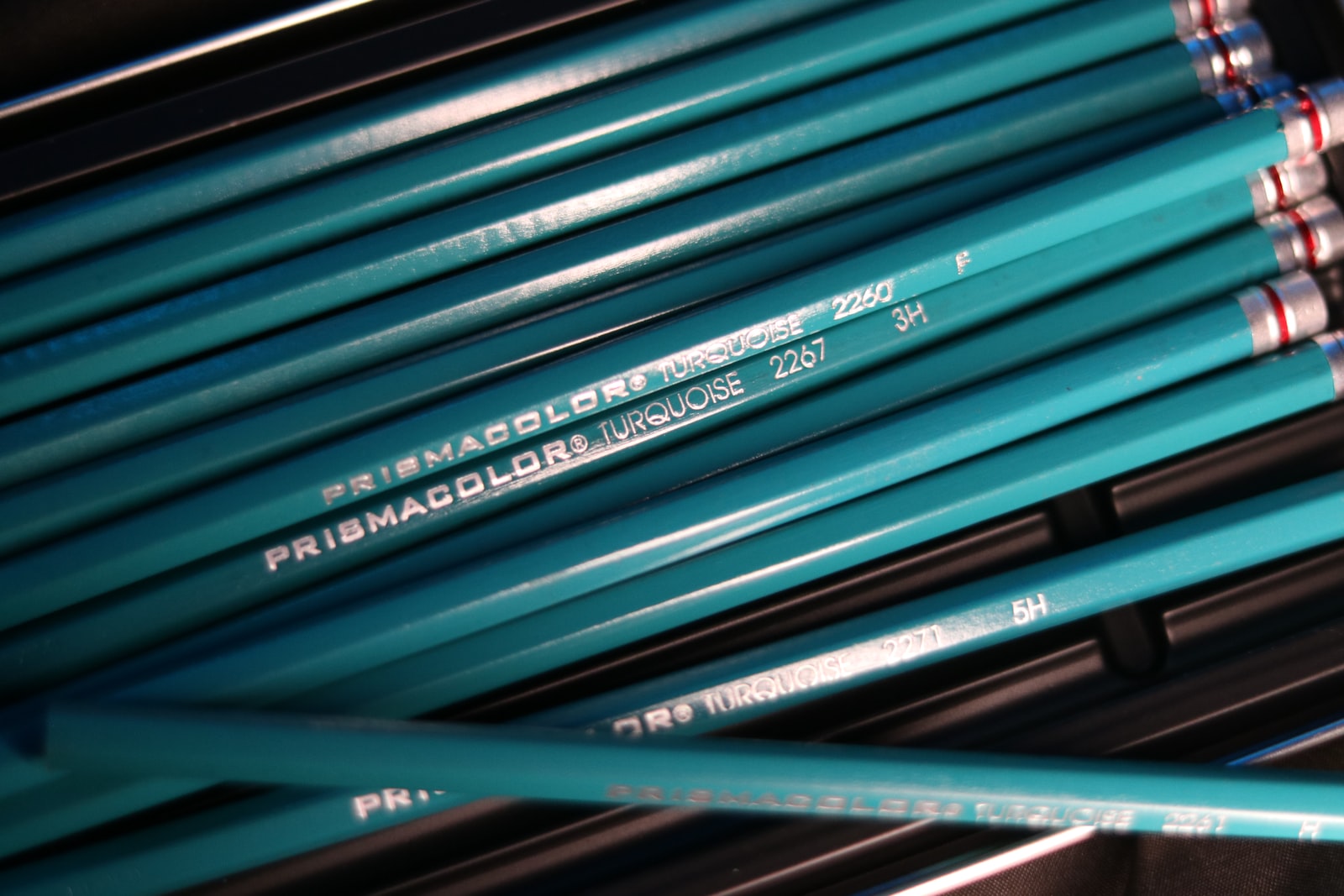 blue and black coloring pencils